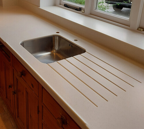 Undermount sink, non drip lip and seamless window sill ( crema 31048)